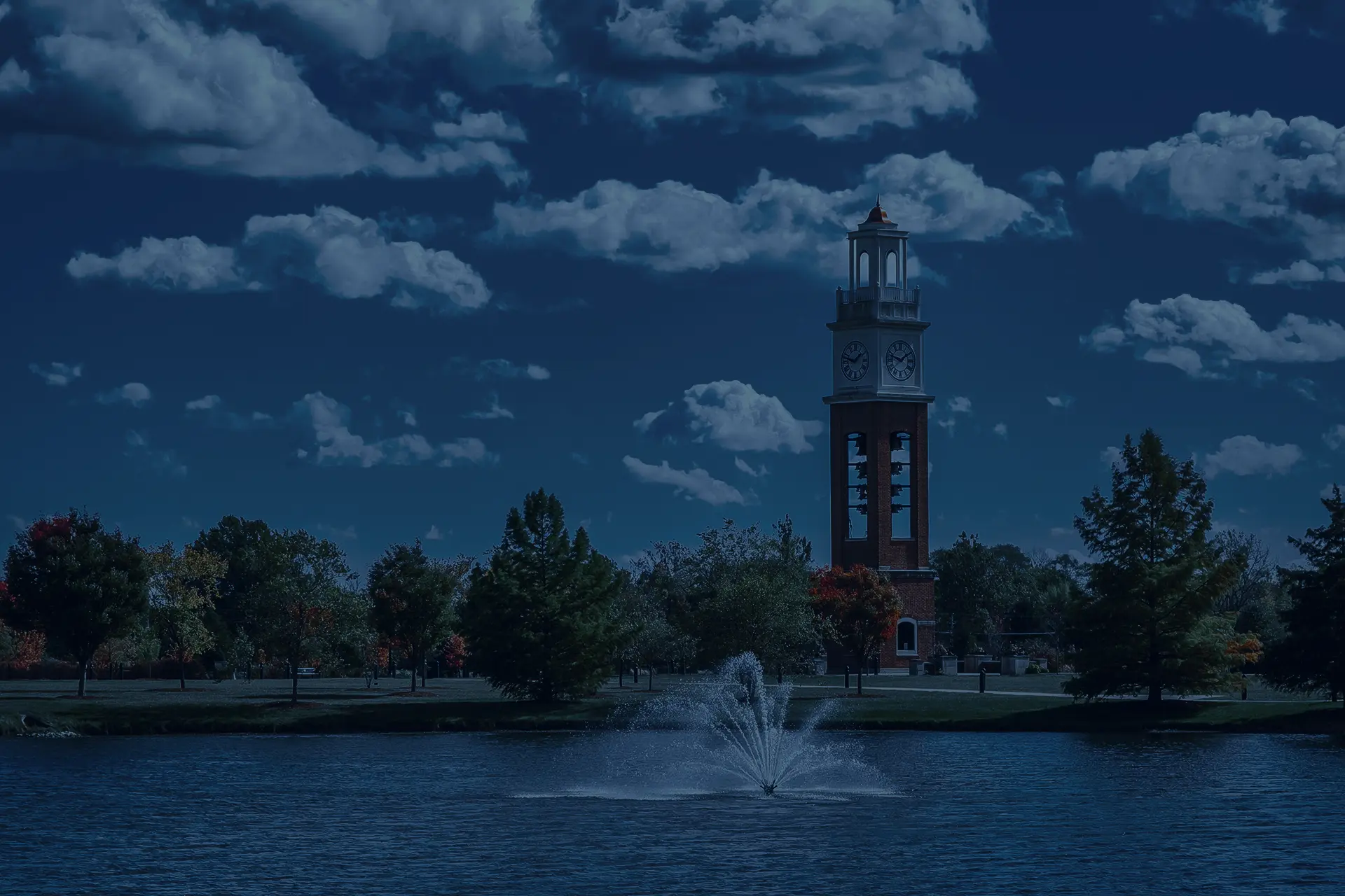Carmel, Indiana landmark clock tower and fountain representing reliable IT support for Carmel businesses.